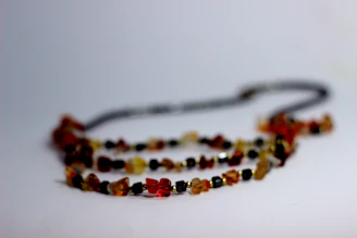 A handcrafted bead necklace blending desert earth and tropical island shades.