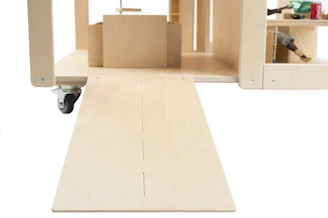 A compact, portable shelving unit ideal for small shops or workshops.