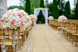 selective focus photography white and pink isle flower arrangement