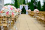 selective focus photography white and pink isle flower arrangement