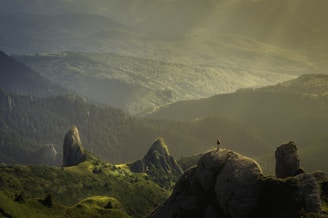 landscape photography of mountain hit by sun rays