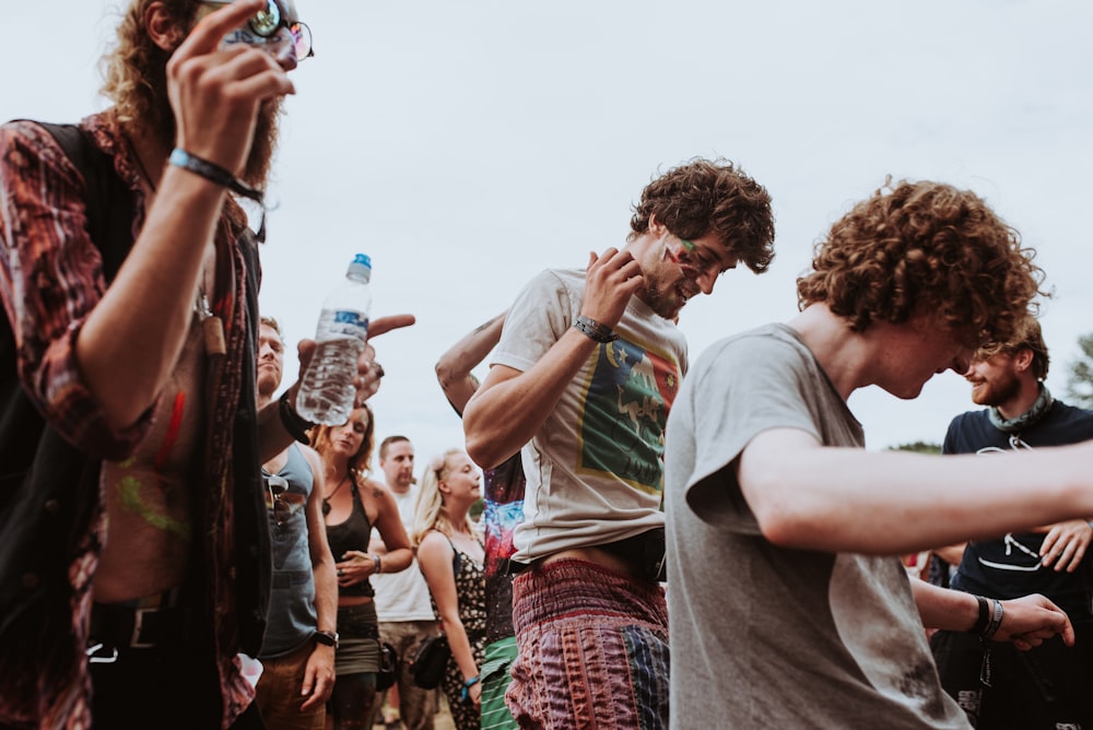 A group of young people enjoying themselves at a music festival