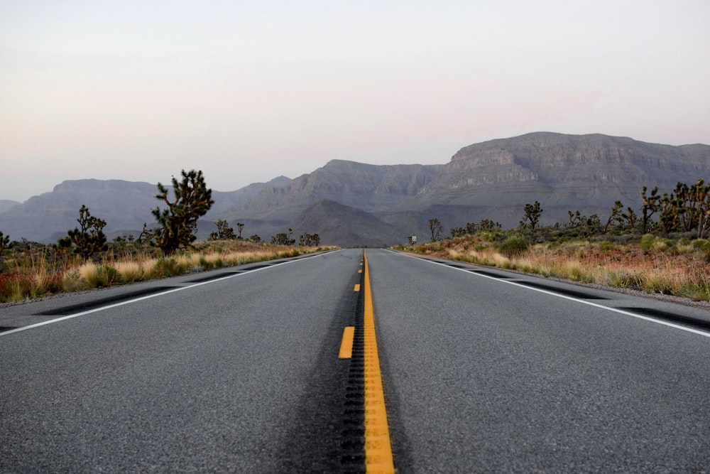 empty road towards mountains
