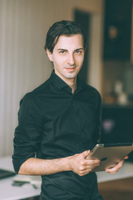 A person using a tablet with a calm background, highlighting a mindfulness and wellness course.
