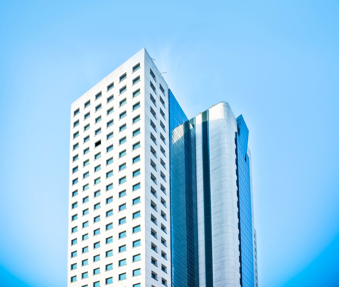 white concrete building under blue sky
