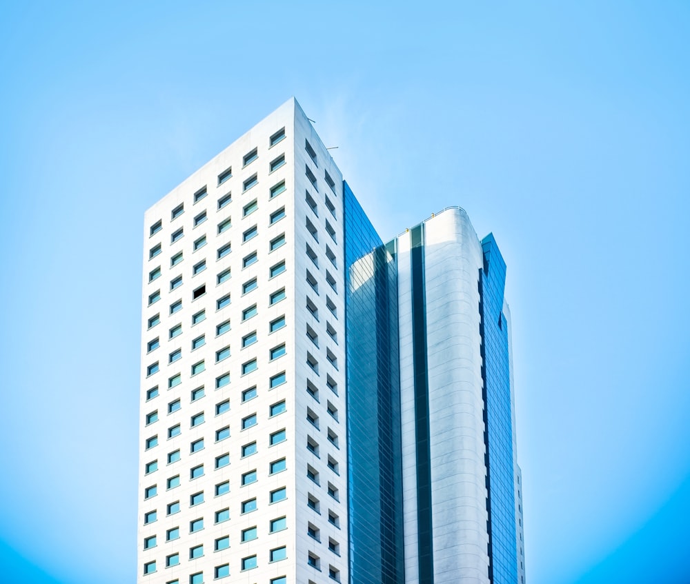 white concrete building under blue sky