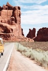 yellow Volkswagen van on road