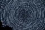 spiral gray and black digital wallpaper
