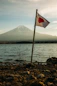 Japan flag mounted near on body of water