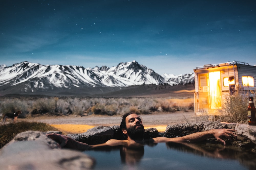 man swimming in spring