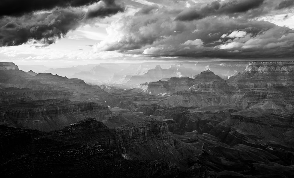 a black and white photo of the grand canyon