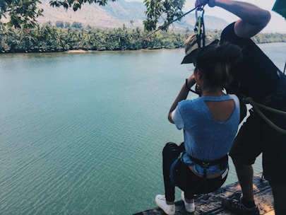 Engineers inspecting a zipline installation for safety.