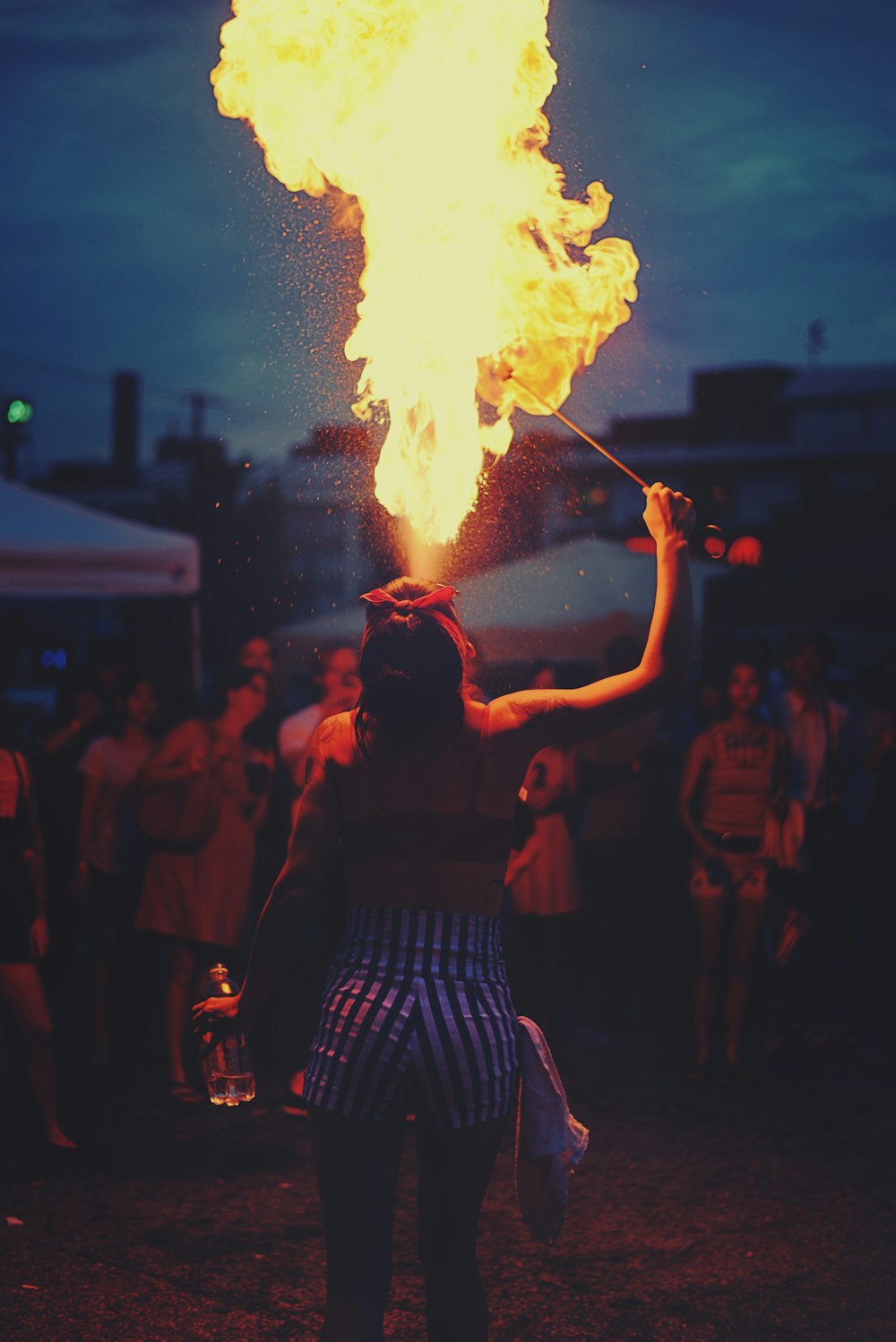 woman performing fire spitting