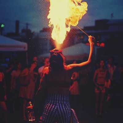 woman performing fire spitting