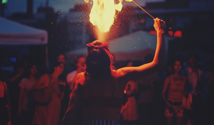 woman performing fire spitting