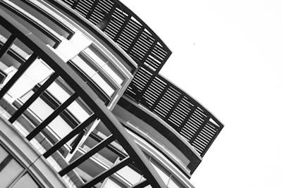 Asymmetrical layout featuring bold geometric shapes and thick dividing lines.