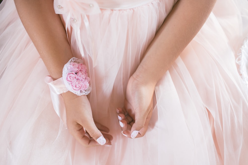 person wearing pink gown