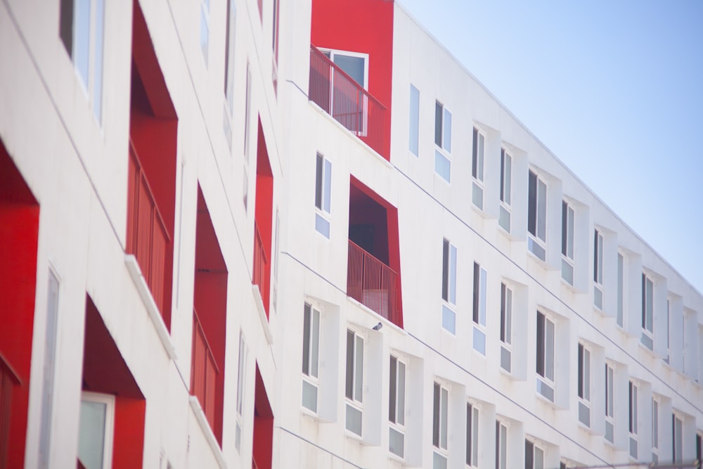 white and red concrete building atime