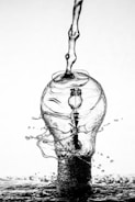 water dropping on light bulb