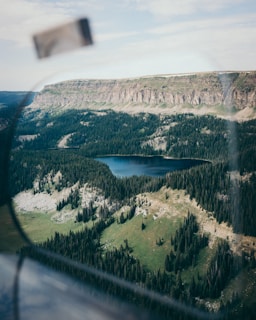 An aerial view of Lake Sevan surrounded by mountains.