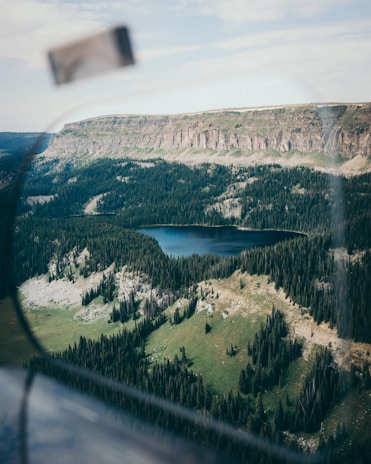 An aerial view of Lake Sevan surrounded by mountains.