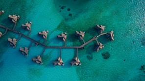aerial photography of resort villa on water