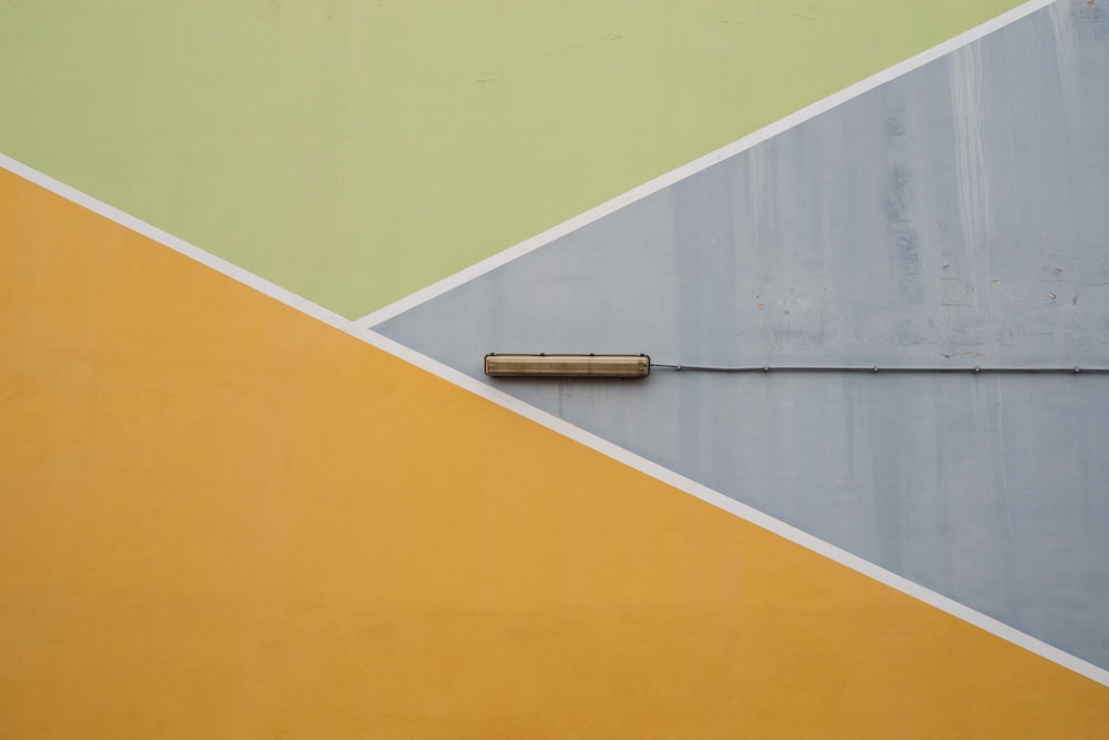 brown wooden door on yellow painted wall