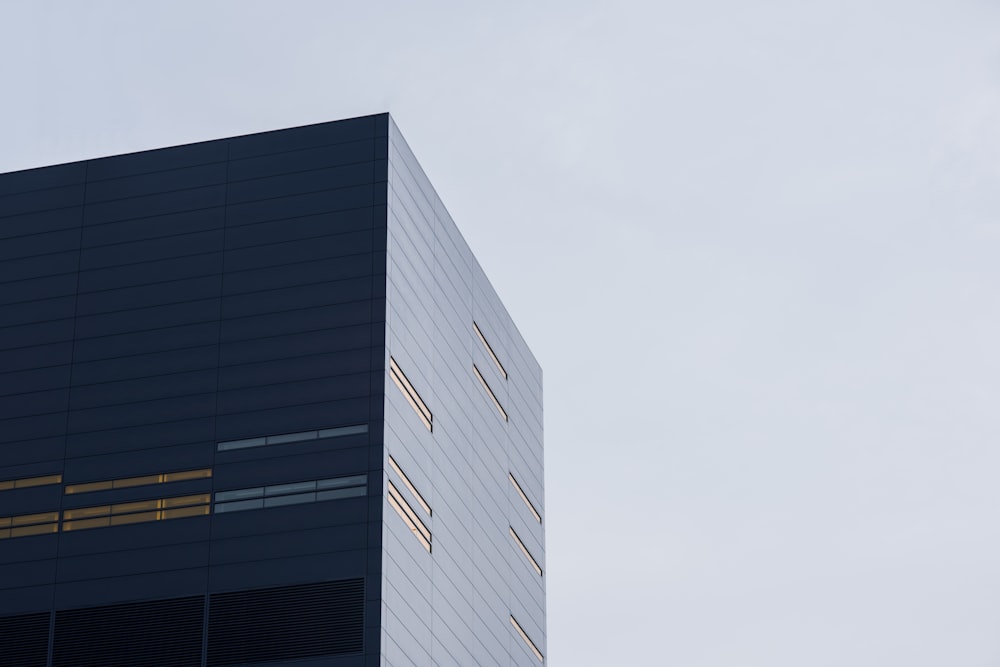 low angle photo of curtain glass wall building