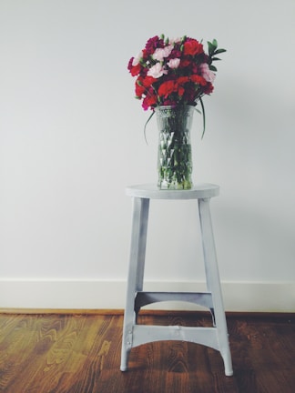 A vibrant bouquet of fresh flowers brightening up a minimalist living room.