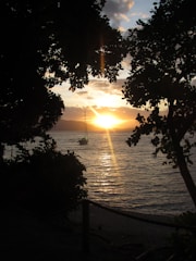 A peaceful sunset view from a boat near Ilhabela.