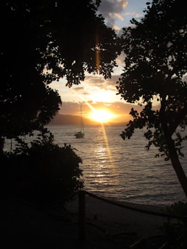 A peaceful sunset view from a boat near Ilhabela.