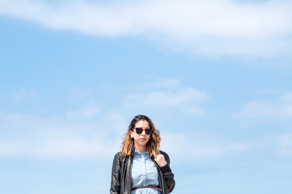 woman wearing black zip-up jacket