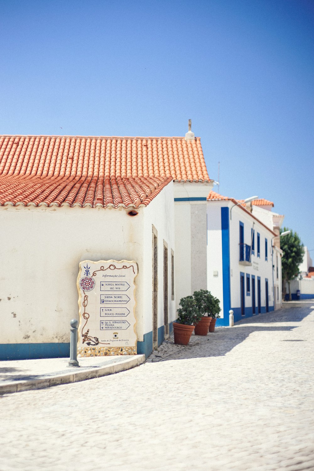 photograph of white concrete houses