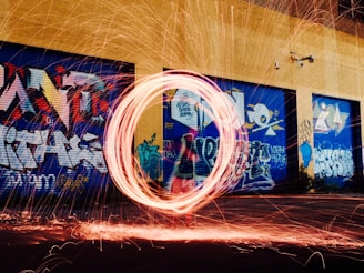 time-lapse photography of woman using steel wool