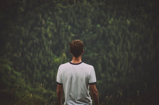 man wearing white ringer tee in Giron France