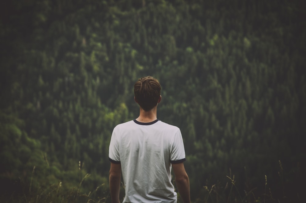 man wearing white ringer tee