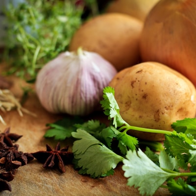 onions and potato on table