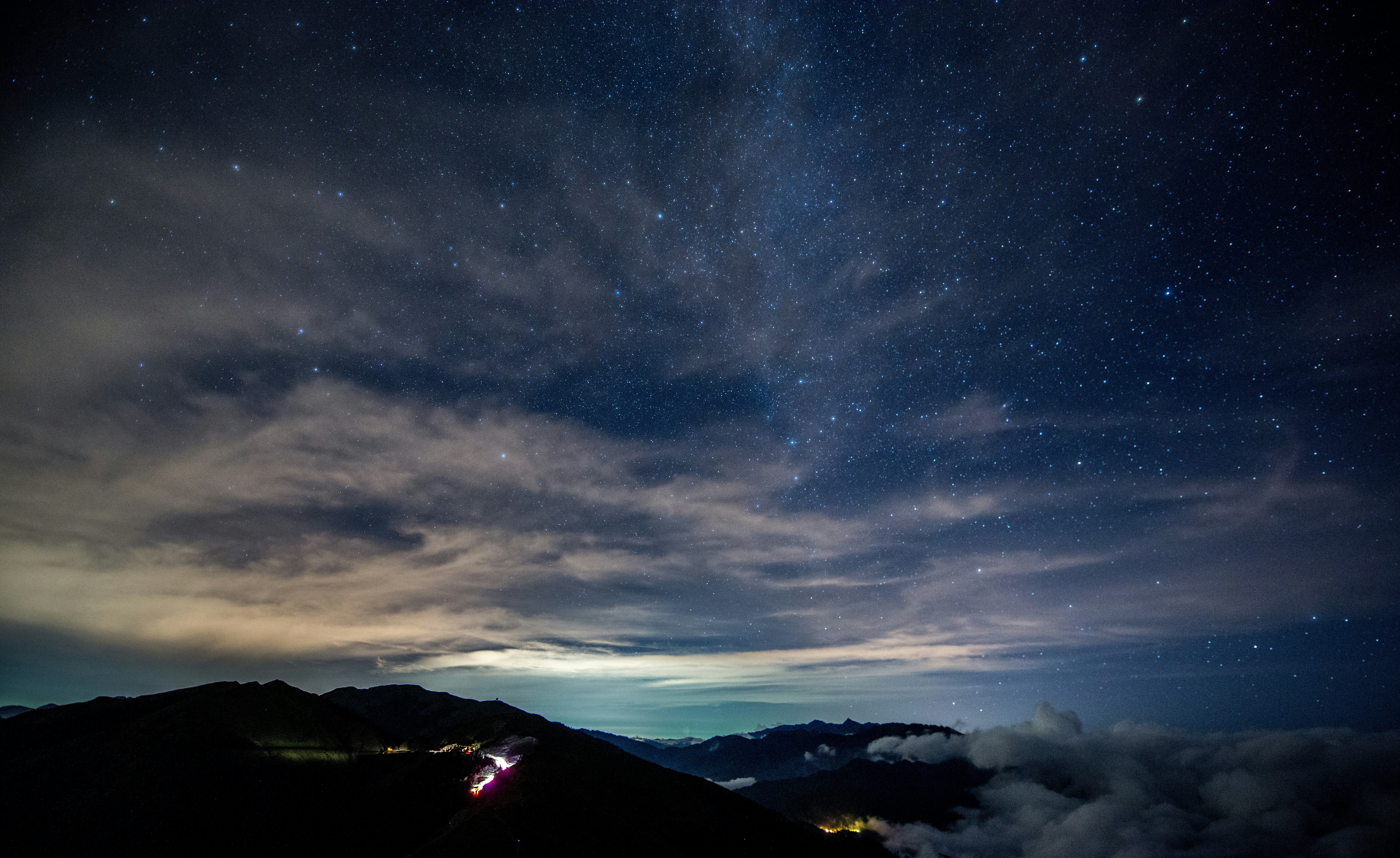 silhouette of mountain under white and gray clouds photo