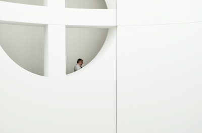 man near white window contemporary zoom background