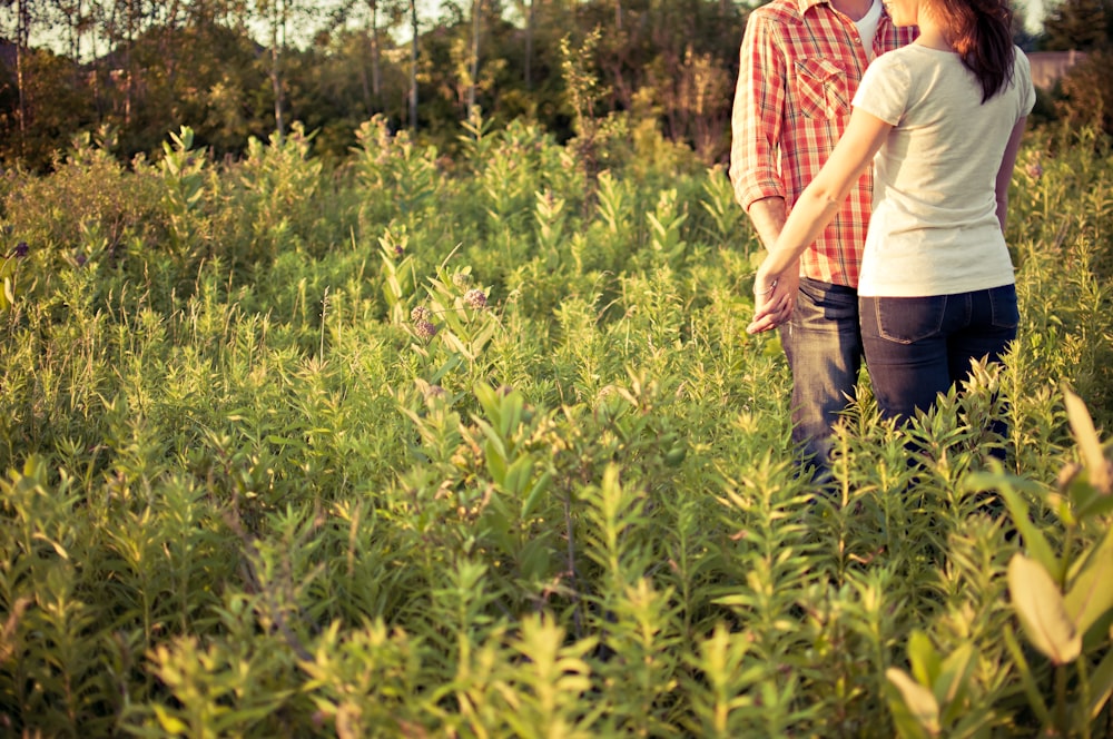 couple in grass field