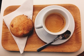 A quick bite snack plate paired with a hot espresso, perfect for a midday boost.