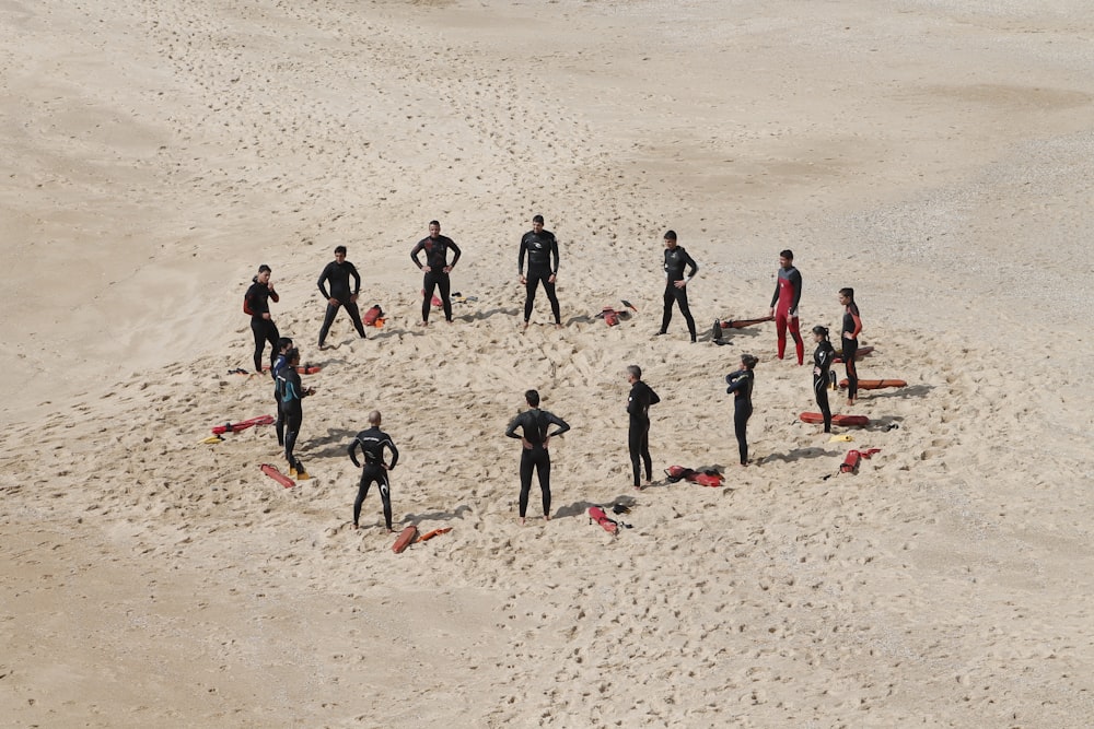 people standing forming a circle during daytime