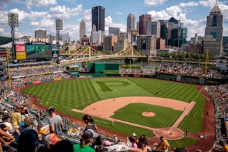 game at baseball court surrounded by fans