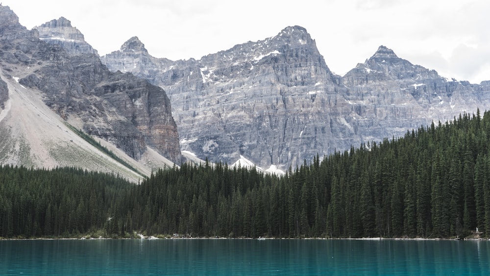 mountain ranges near body of water during daytime