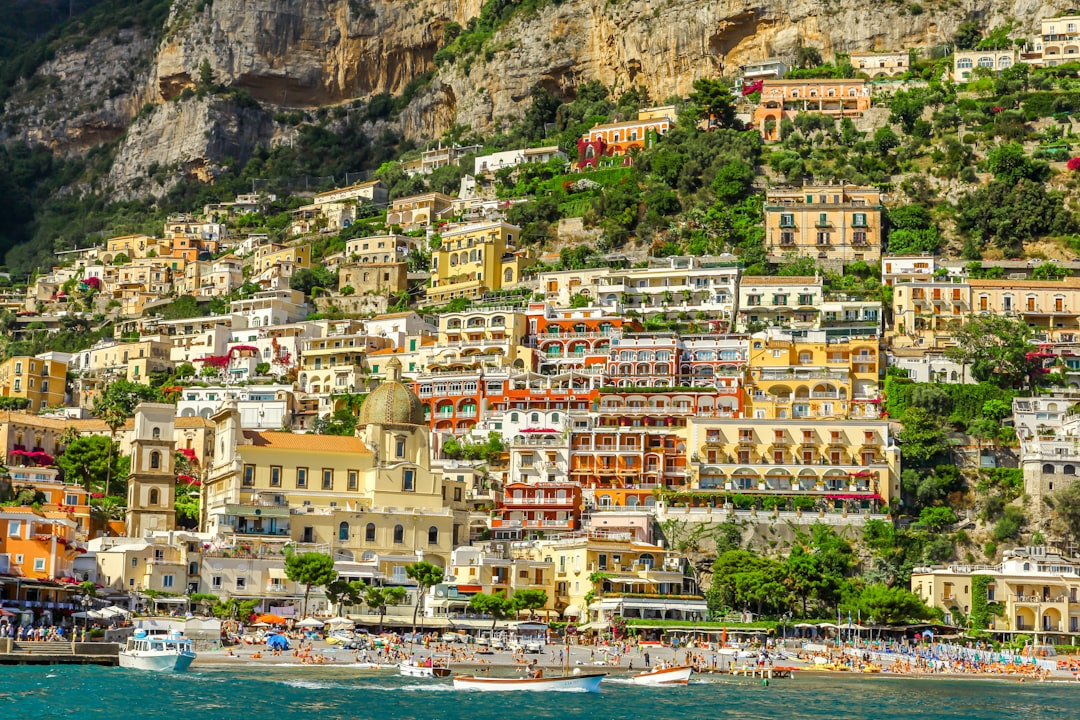 landscape photography of village on cliff,