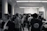 Photo of a lively international business conference with diverse attendees networking and exchanging ideas.