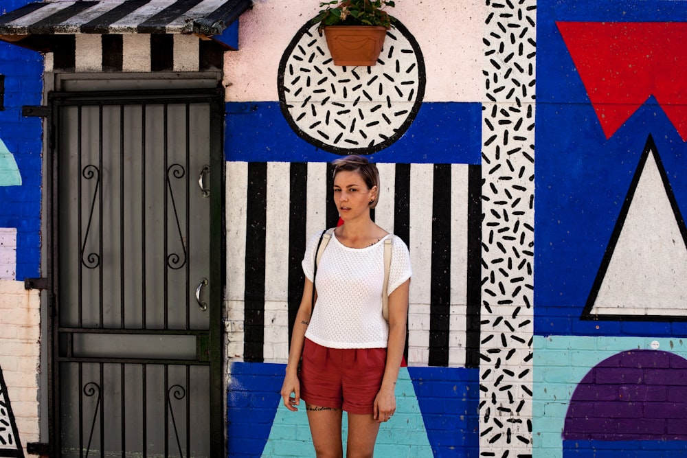 women wearing red short close-up photography