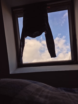 Skylark shirt displayed on a mannequin with natural sunlight highlighting the fabric texture.