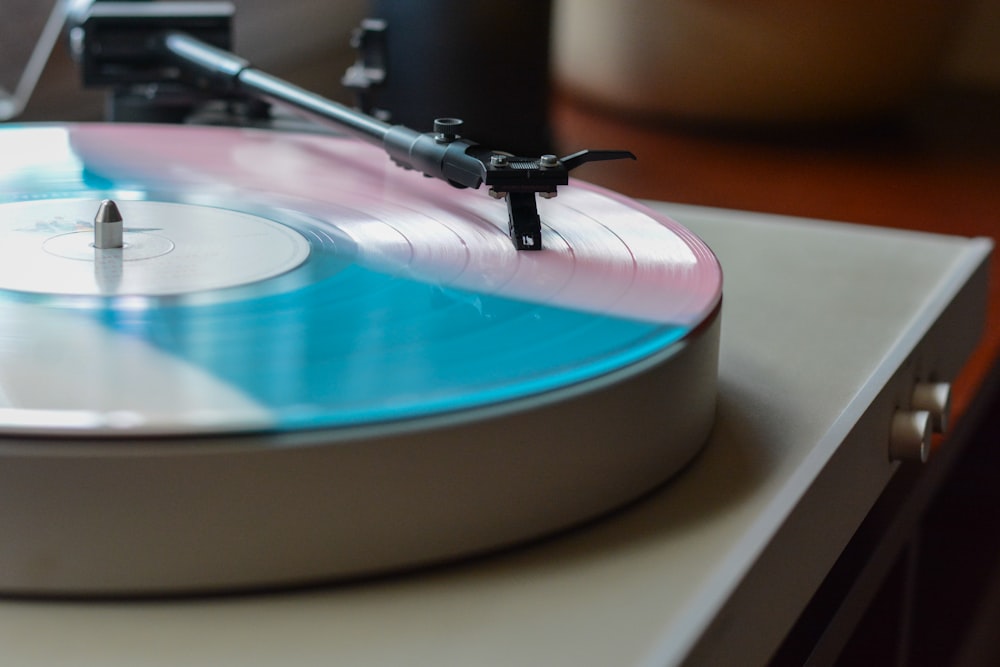 vinyl record on white vinyl player