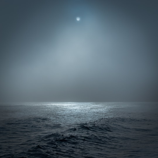 full moon lighted body of water in Southwold United Kingdom